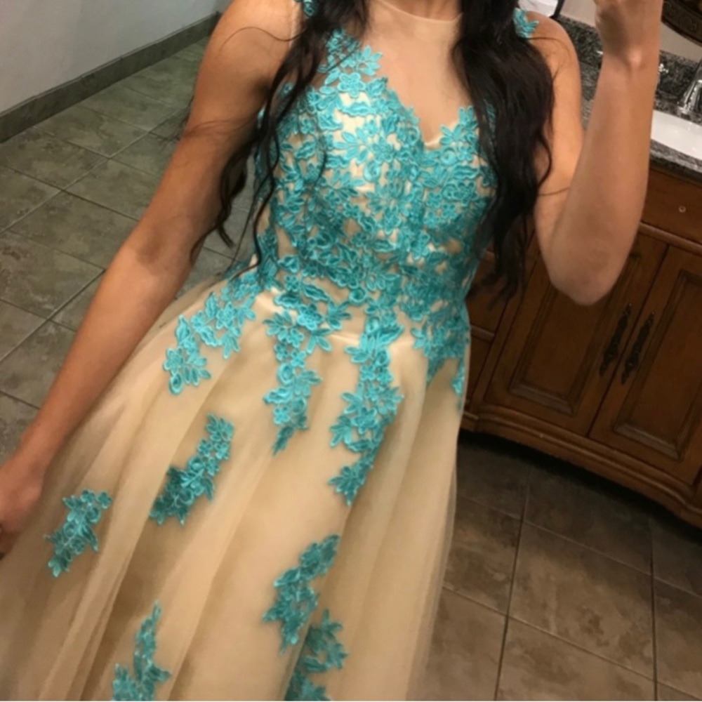 beige/skin color dress with blue details